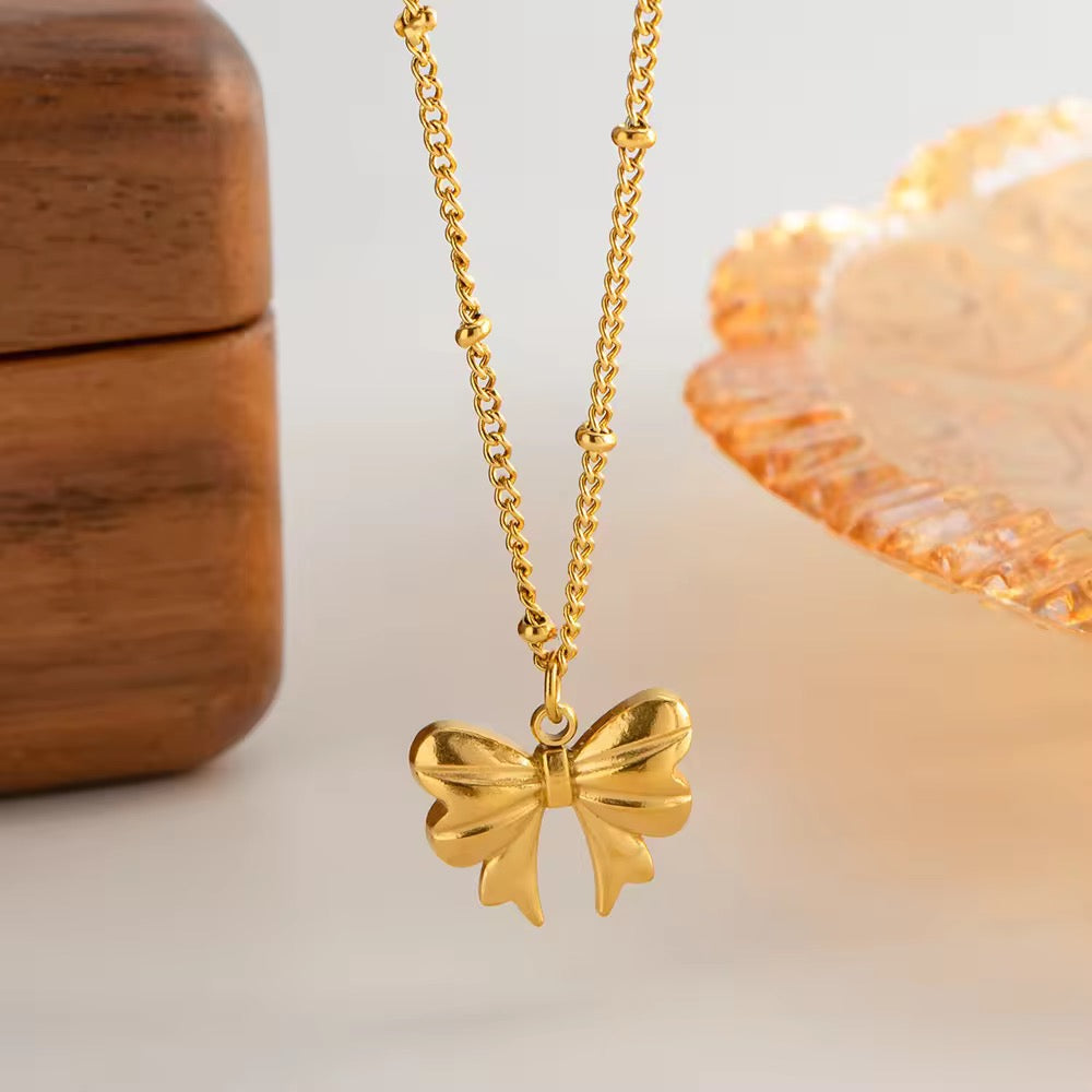Tiny Golden Bow Necklace