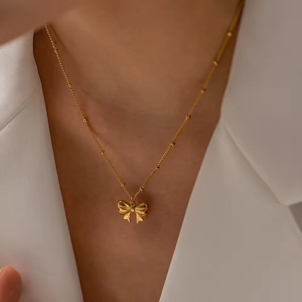 Tiny Golden Bow Necklace